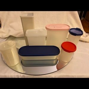Lot of Tupperware containers with lids in good preowned condition. 7 PCs.